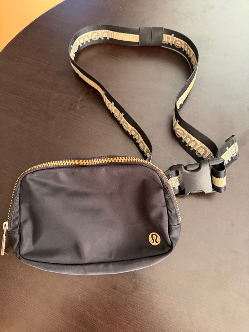 lululemon athletica Black Waist Bag with Gold Trim